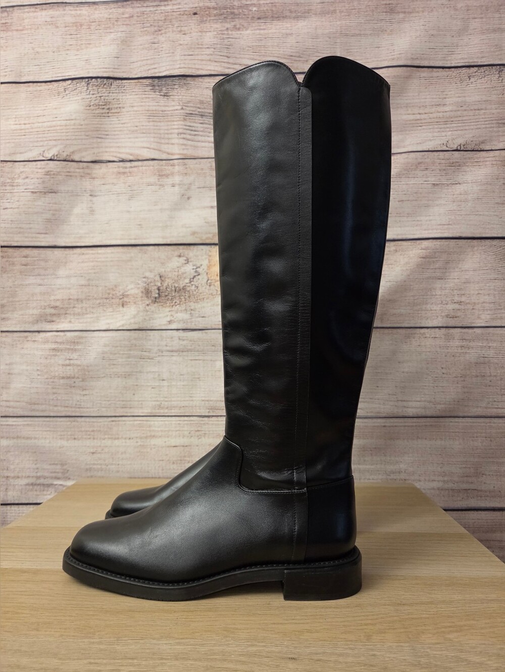 Square Toe Riding Boot
Stuart Weitzman. - Picture 3 of 13